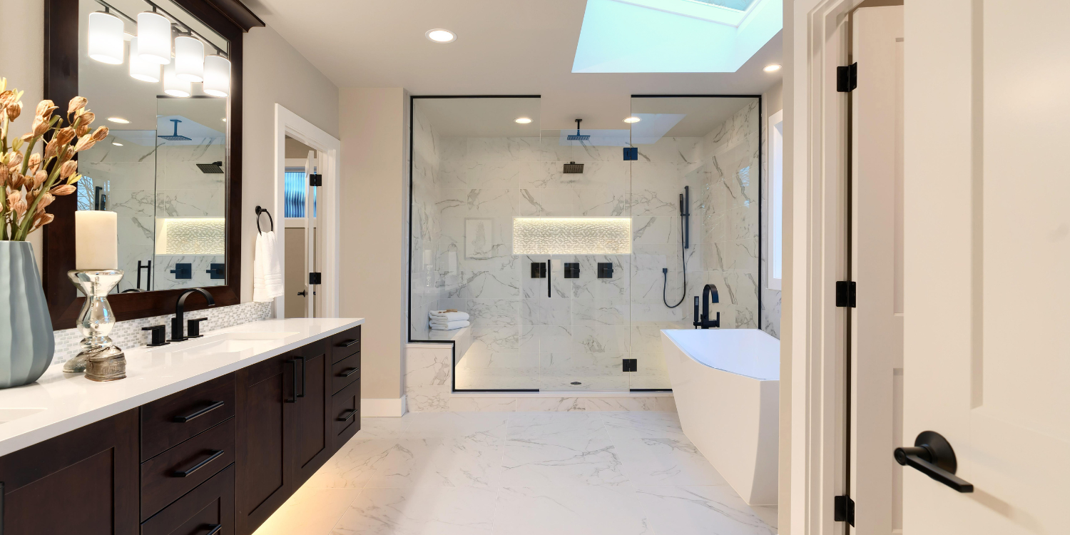 Luxury Bathroom in white with stand alone tub and large shower - Transform Your Ensuite Bathroom with These 2024 Trends